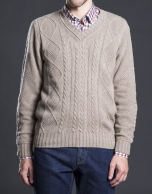 Brown V-neck sweater with cable stitch design