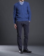 Blue V-neck sweater with cable stitch design 