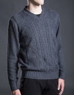 Gray V-neck sweater with cable stitch design