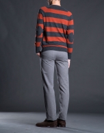 Gray and orange striped knit sweater with elbow patches