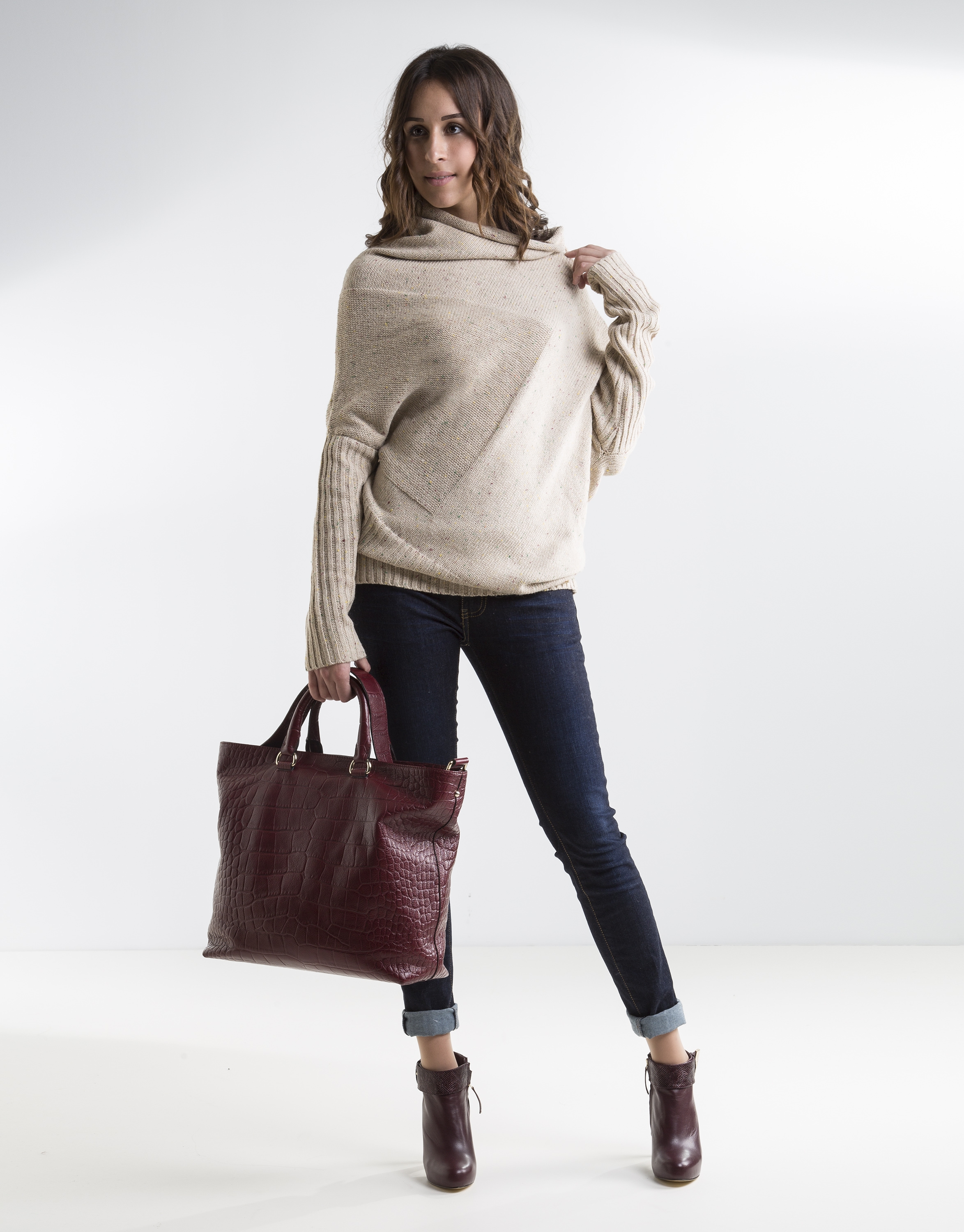 Long beige asymmetric sweater