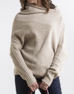 Long beige asymmetric sweater