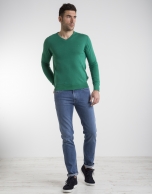 Green V-neck sweater