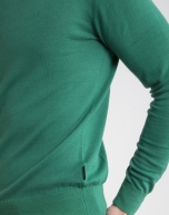 Green V-neck sweater