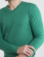 Green V-neck sweater