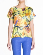 Loose yellow floral print silk blouse. 