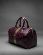 Burgundy leather Carmen Andromeda bag with embossed snake and old gold stripe