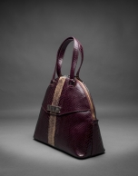 Scarlet leather Leonor Andrómeda bag with embossed snake and old gold stripe