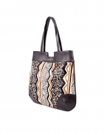 Birdy Kenia print fur and black leather bag 