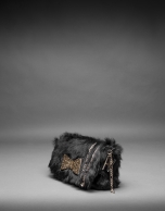 Black rabbit fur Poppy bag with an old gold crystal bow