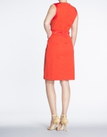 Fitted red dress with appliqué at waist