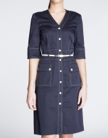 Navy blue three quarter sleeve shirtwaist dress.