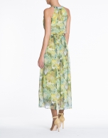 Green and yellow sleeveless print dress.