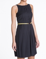 Navy blue sleeveless dress with tucks.