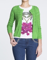 Green sweater with ripple effect