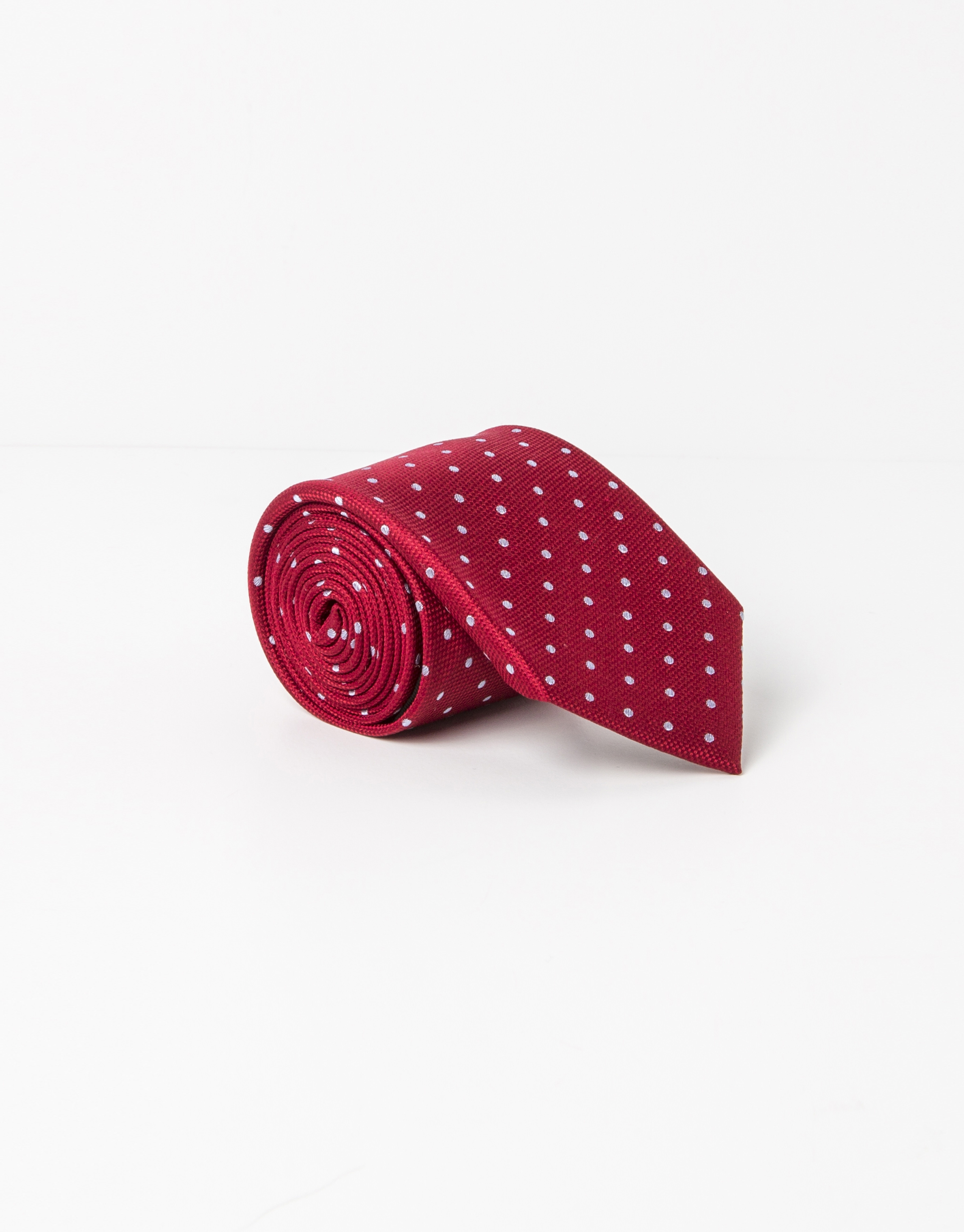 Corbata topos beige fondo rojo