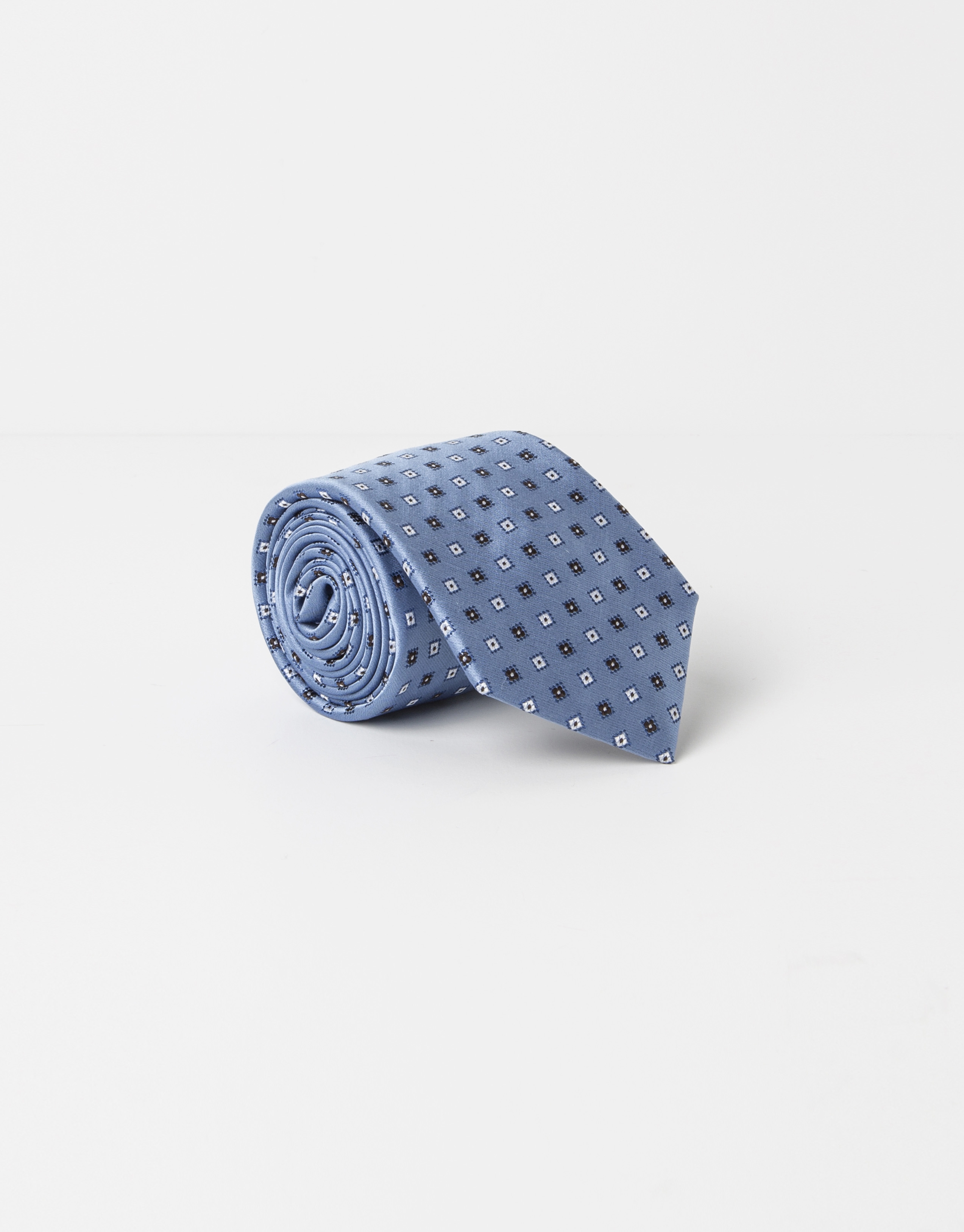 Blue tie with beige dots