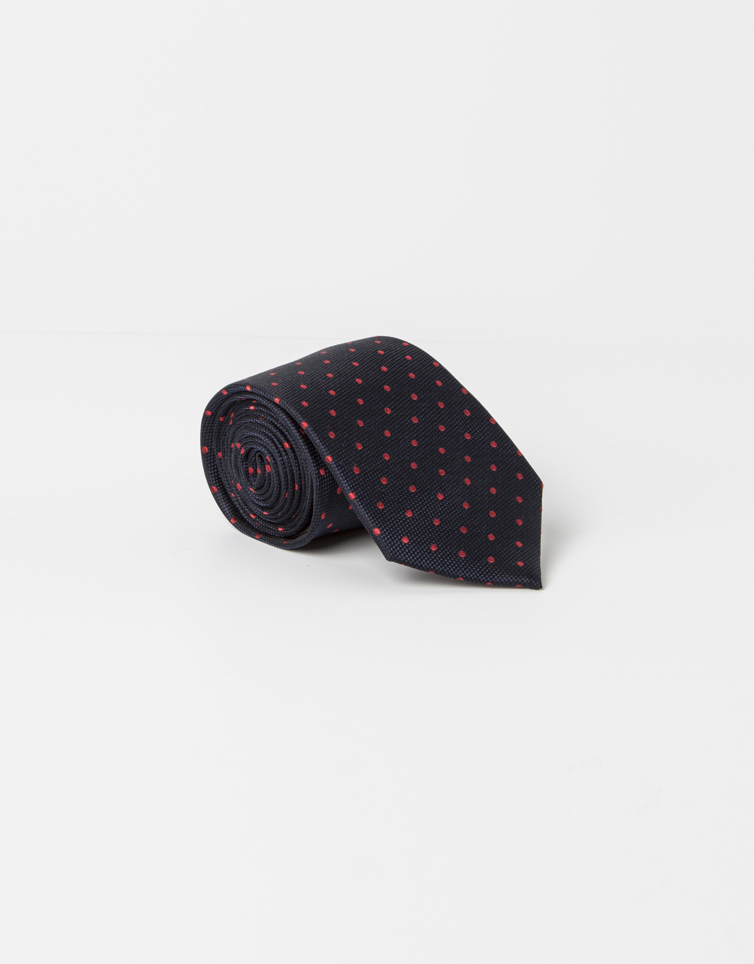 Navy blue tie with red dots