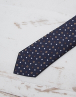 Navy blue tie with beige flowers