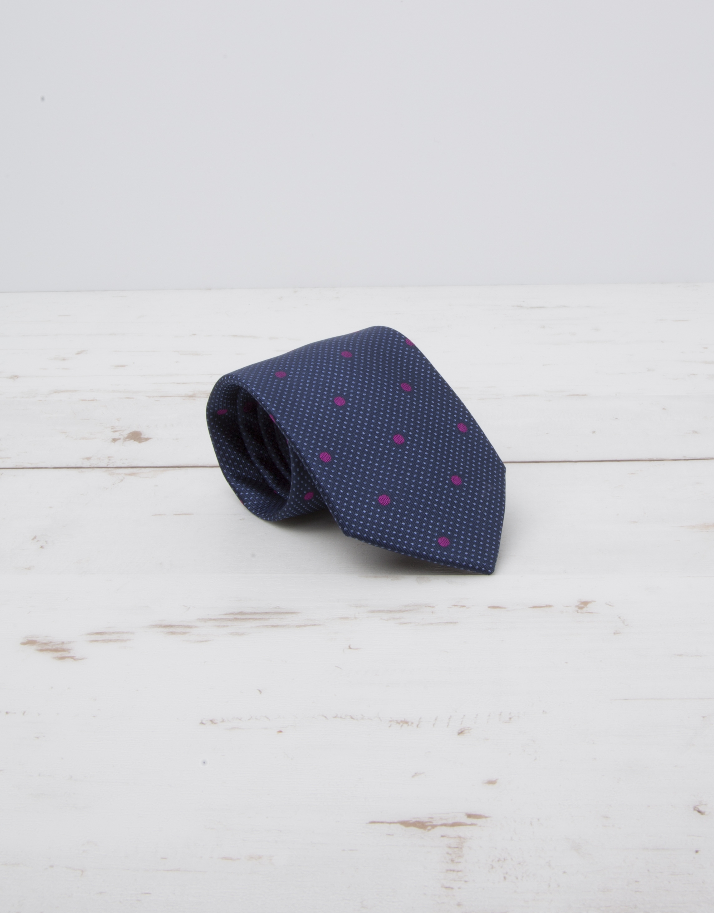 Navy blue tie with large purple dots