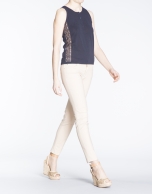 Navy blue knit top with passementerie on sides