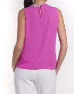 Round neck top with asymmetric beading