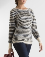 Long black and beige sweater with design