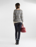 Long black and beige sweater with design