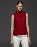 Maroon top with high draped collar