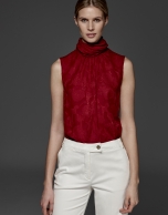 Maroon top with high draped collar