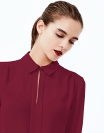 Burgundy shirt with central pleat