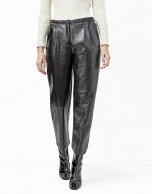 Black embossed alligator leather pants