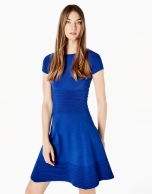 Blue knit dress with flounce