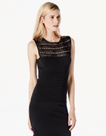 Long black knit dress with openwork