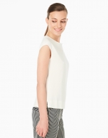 Cream-colored sleeveless top