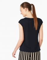 Navy blue-colored sleeveless top