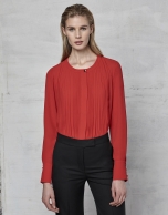 Red blouse with tucks