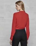 Red blouse with tucks