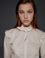 Ivory shirt with shoulder flounces 