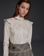 Ivory shirt with shoulder flounces 