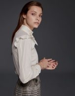 Ivory shirt with shoulder flounces 