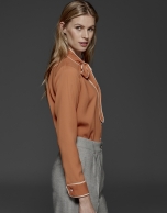 Orange shirt with bow collar