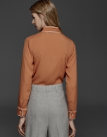 Orange shirt with bow collar