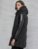 Black ski jacket with leather sleeves