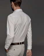 White shirt with brown microprint