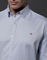 Light blue shirt with red dots