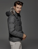 Grey windbreaker with hood and fur collar