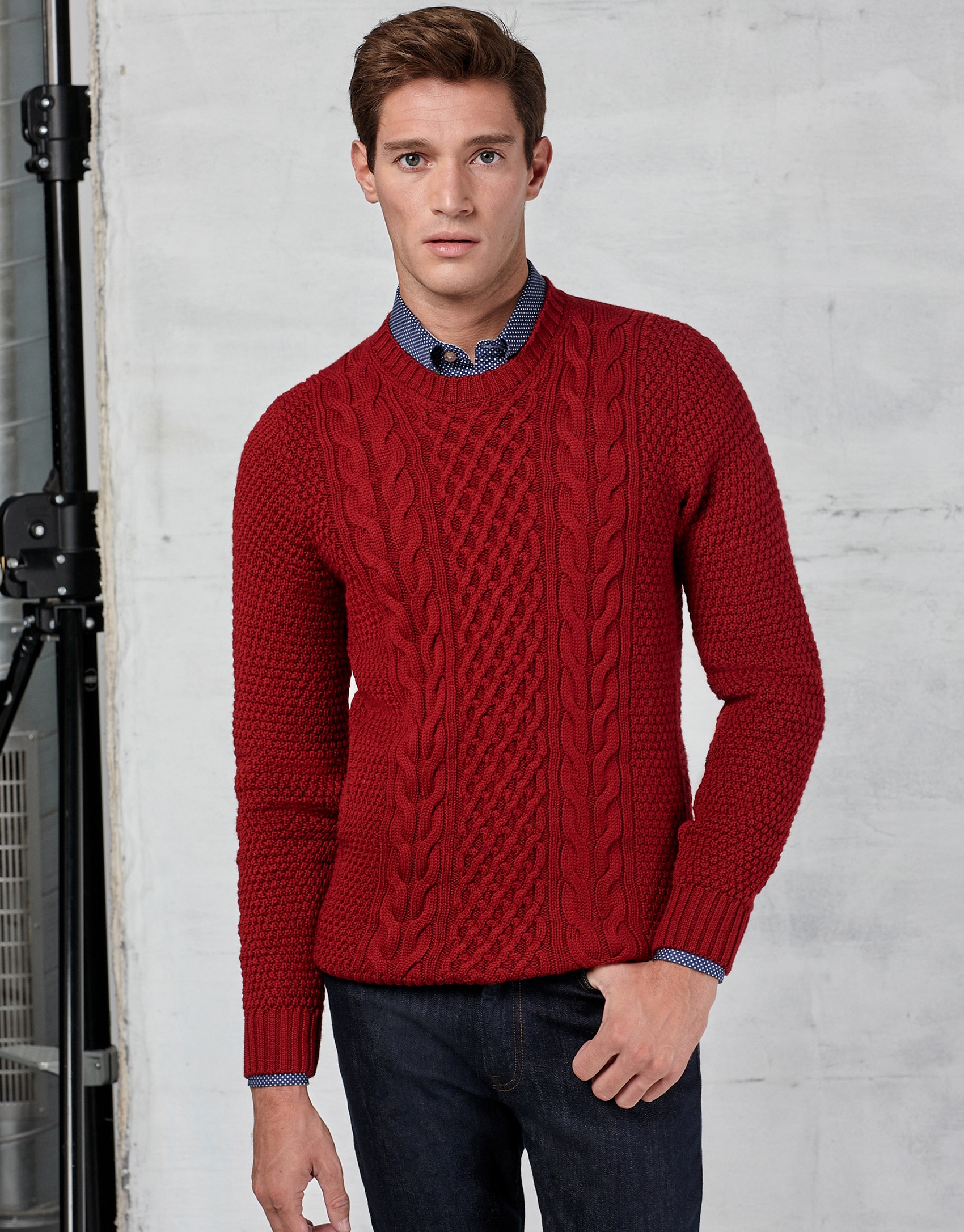 Red braided and cable-stitched sweater