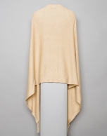 Beige cape with fringe