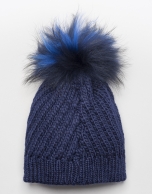 Blue cable knit wool cap with pompom